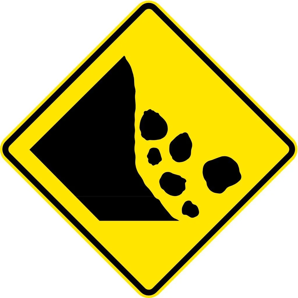 Image of the international road sign for landslides.