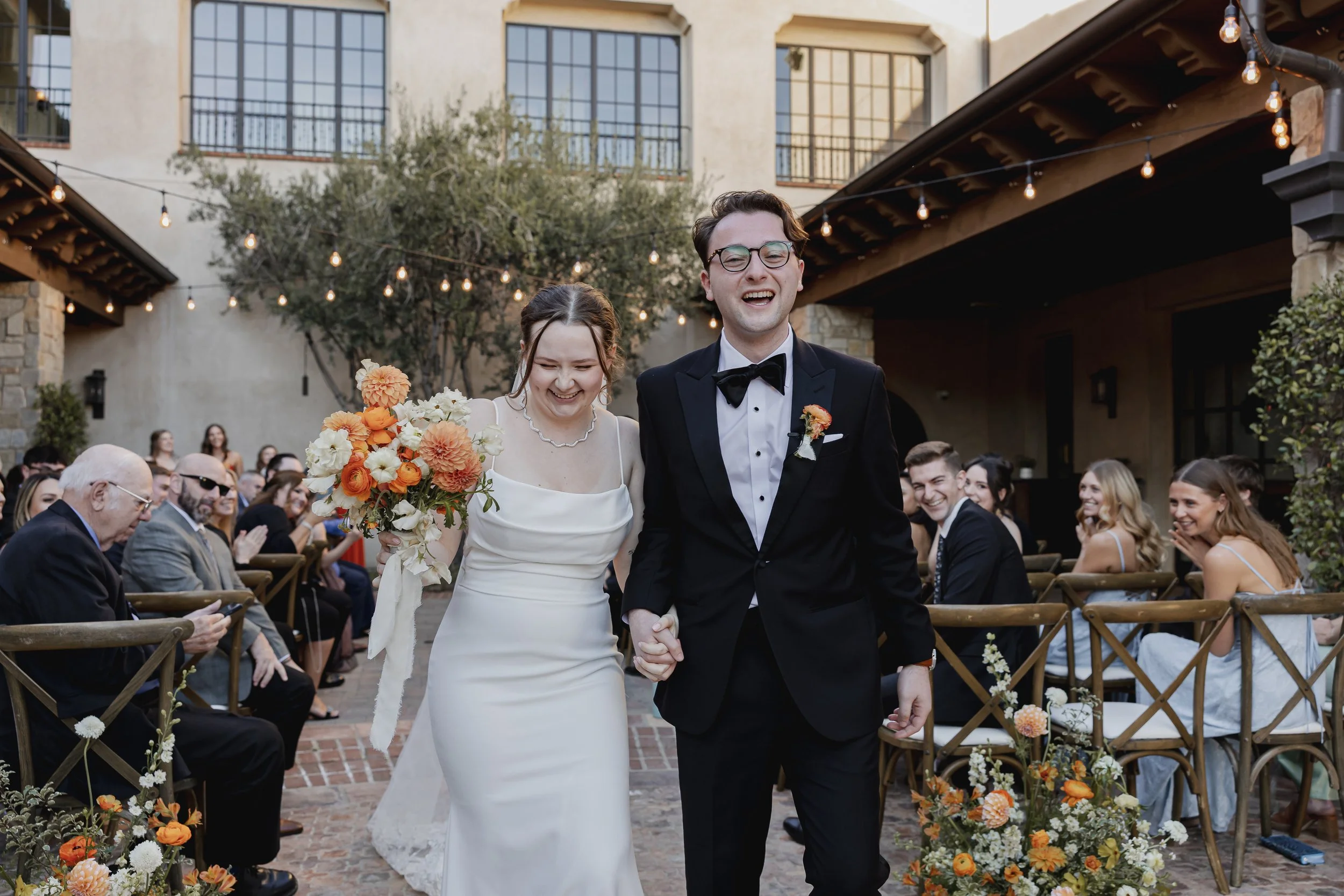 inn-at-the-mission-san-jaun-capistrano-autograph-collection-wedding-ceremony-exit-2.jpg