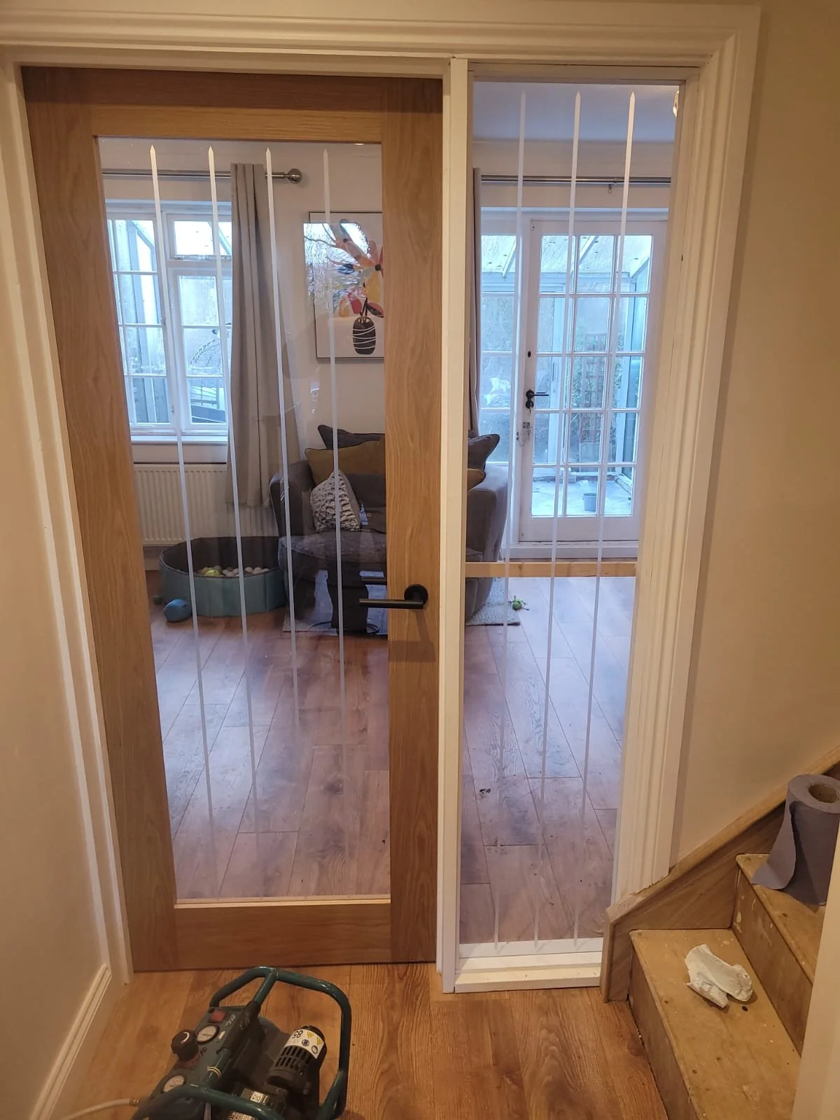 Glazed Howdens door with matching side light