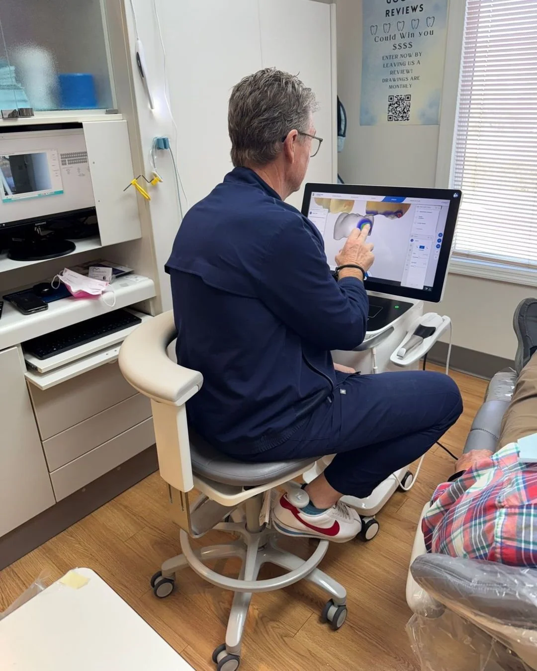 Dr. Ernie carefully designing a dental crown with precision and dedication. Every detail matters when it comes to restoring your smile.✨