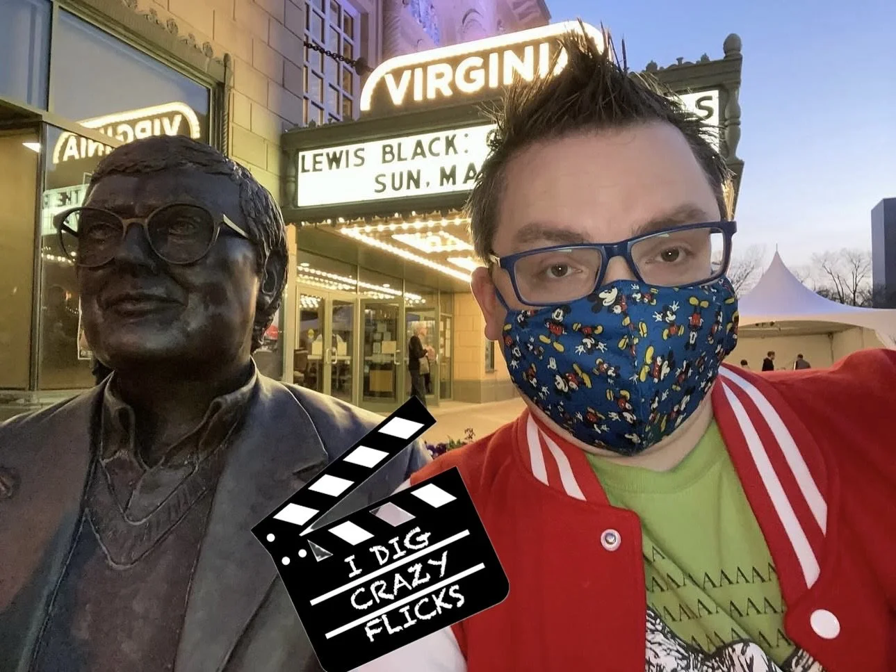 CatBusRuss sitting on the Virginia Theater's Roger Ebert bench