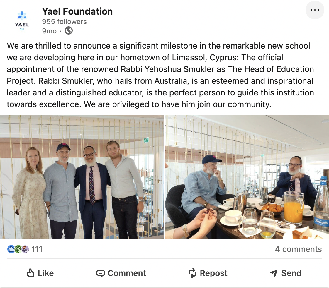 Group of four people standing together and two people sitting at a table during a meal in a modern, well-lit restaurant or cafe.