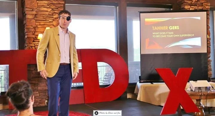 Tanner Gers Ted Talk yellow suit jacket