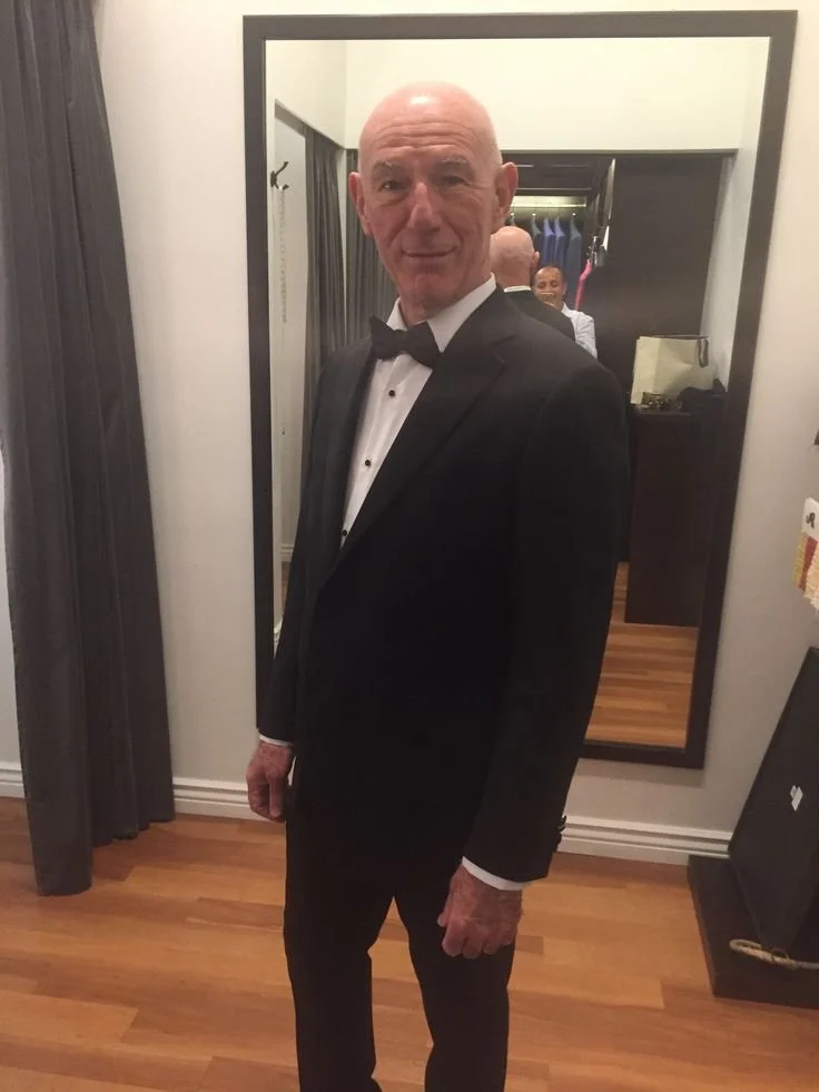 Man in black tuxedo with bowtie