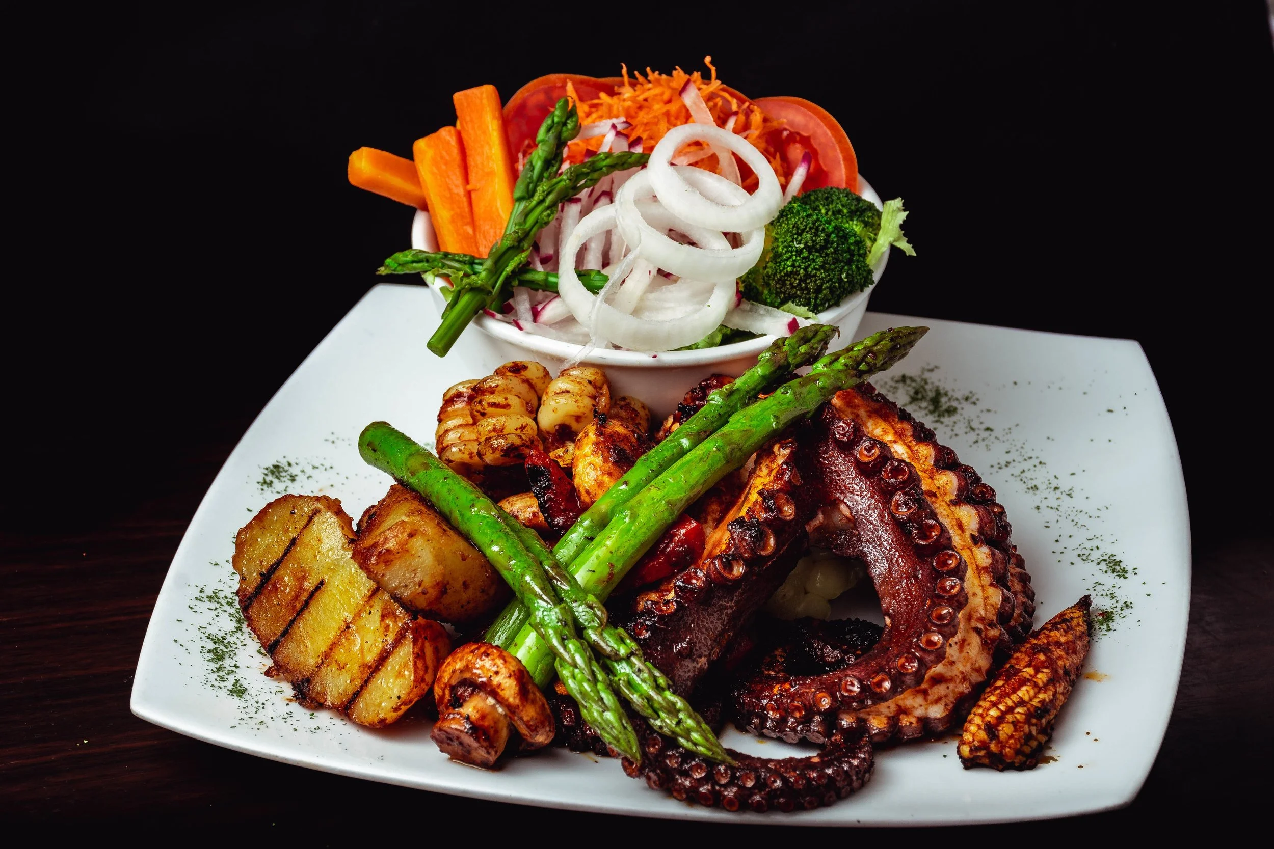 closeup_shot_delicious_roasted_octopus_dish_with_roasted_asparagus.jpg