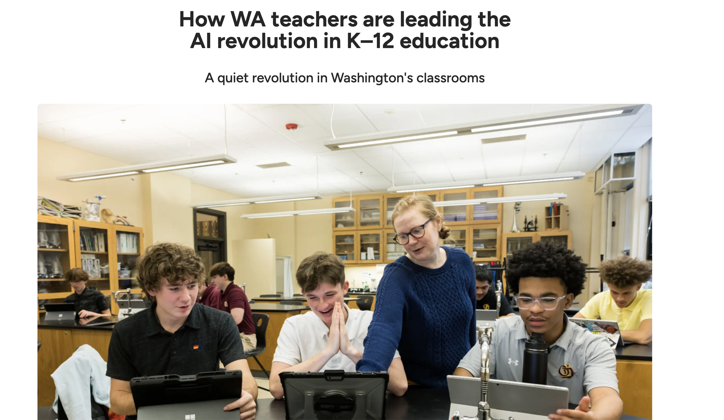 A classroom with students and a teacher working together, engaging with tablets and science equipment, in a well-lit room with shelves and cabinets.
