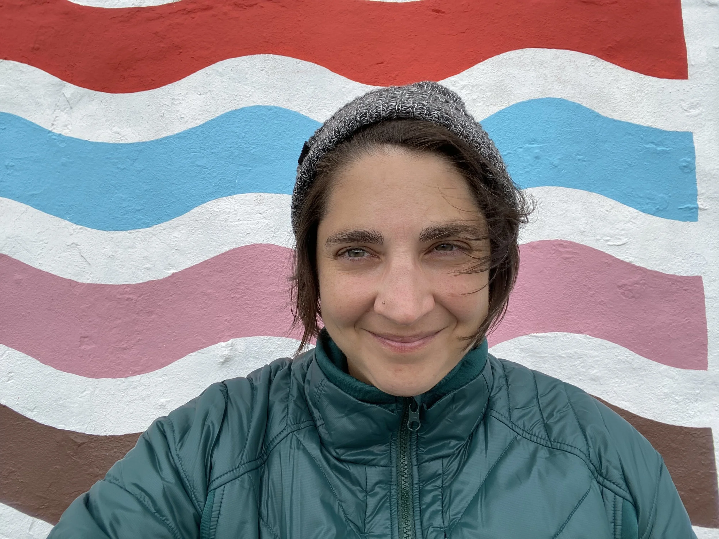 Colorful background, person smiling