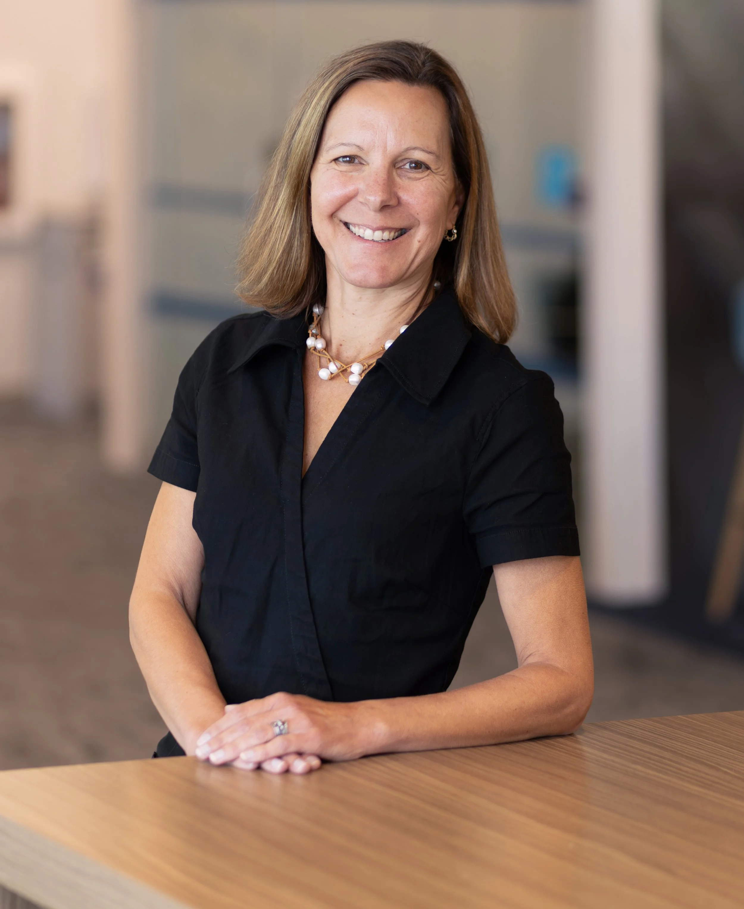 woman in a black shirt
