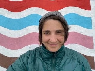 Colorful background, person smiling