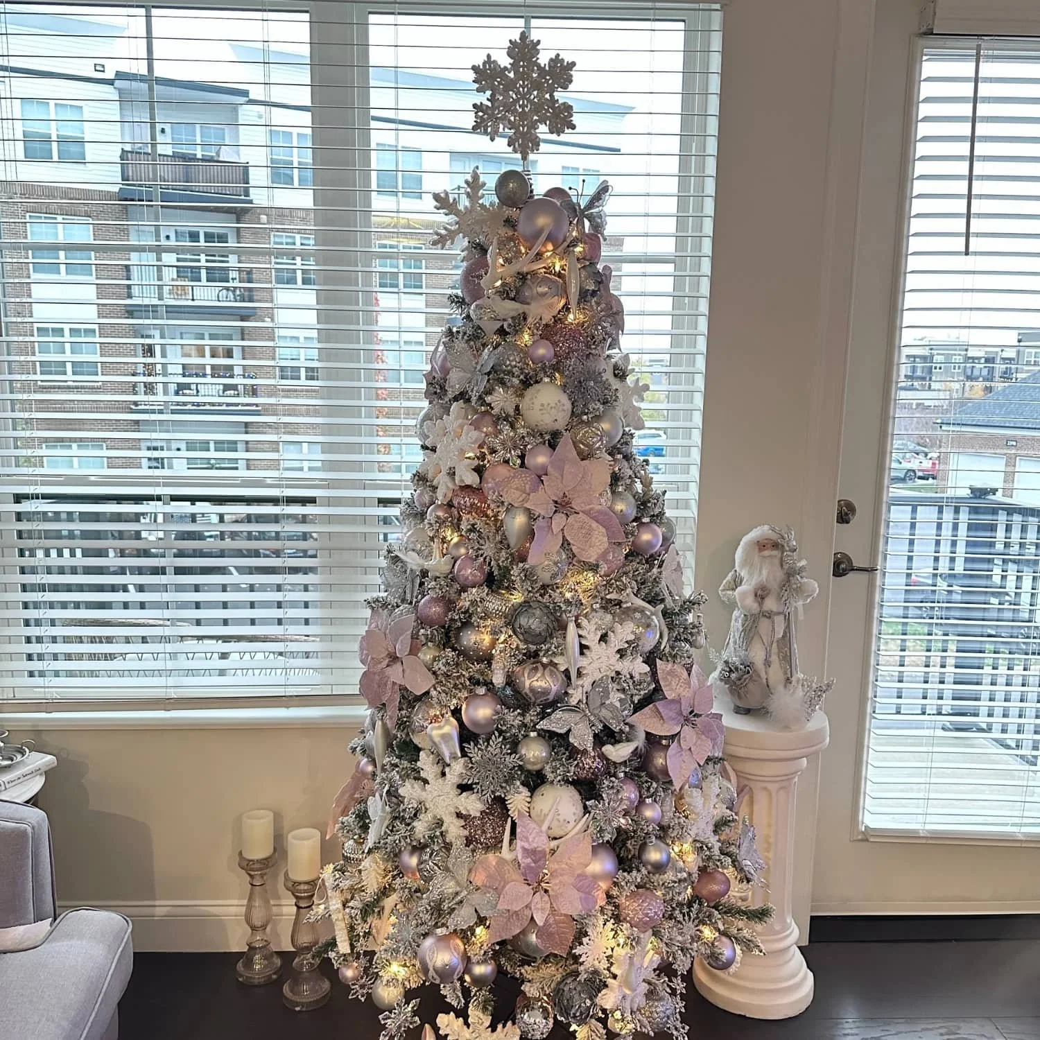 A decorated artificial Christmas tree with burnt-out lights in the middle section, showing how even artificial trees wear out and don’t last forever.