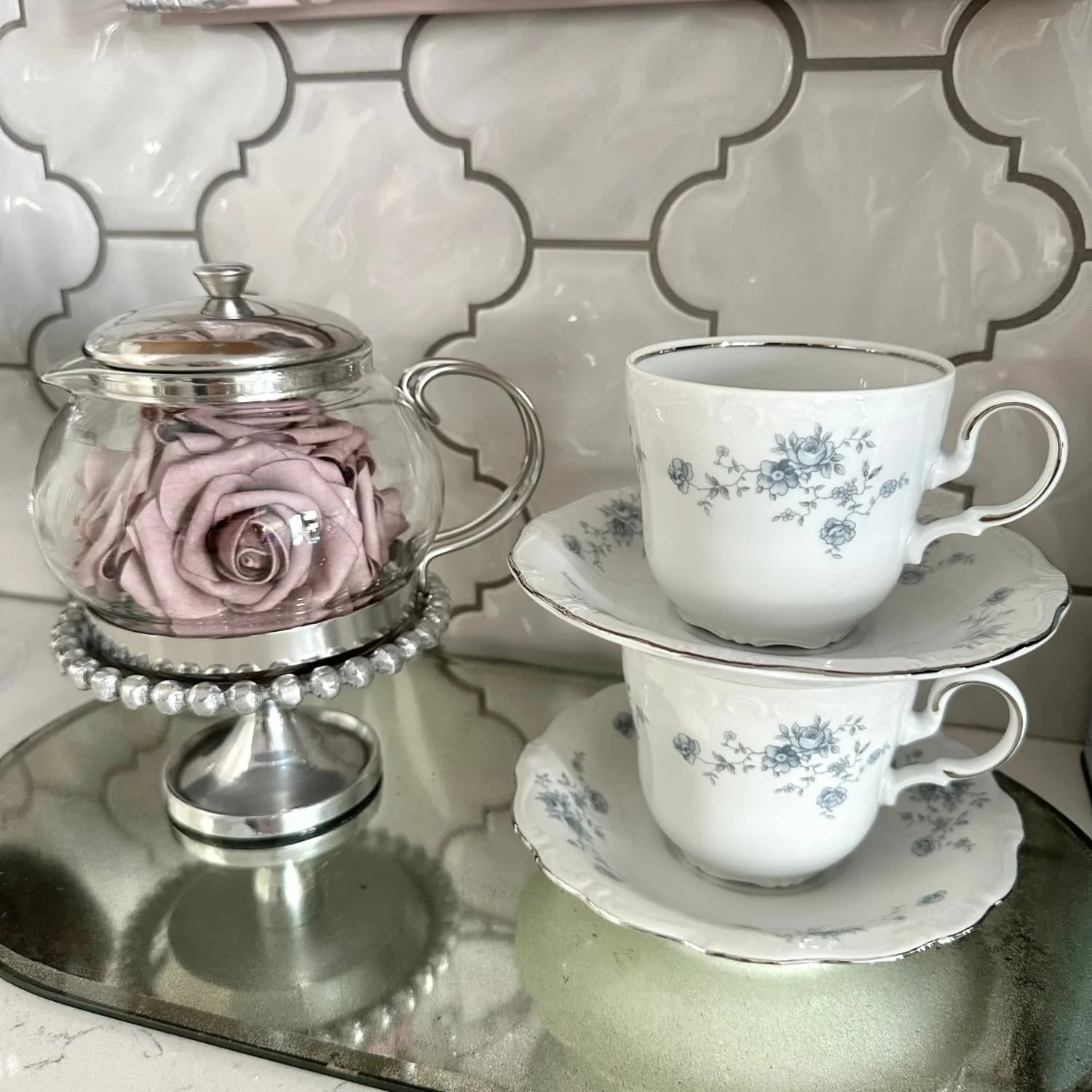 Vintage teacups from a china set originally gifted by my dad to my mom, with additional pieces found through thrifting—helping me complete the set and stay connected to my family’s past.