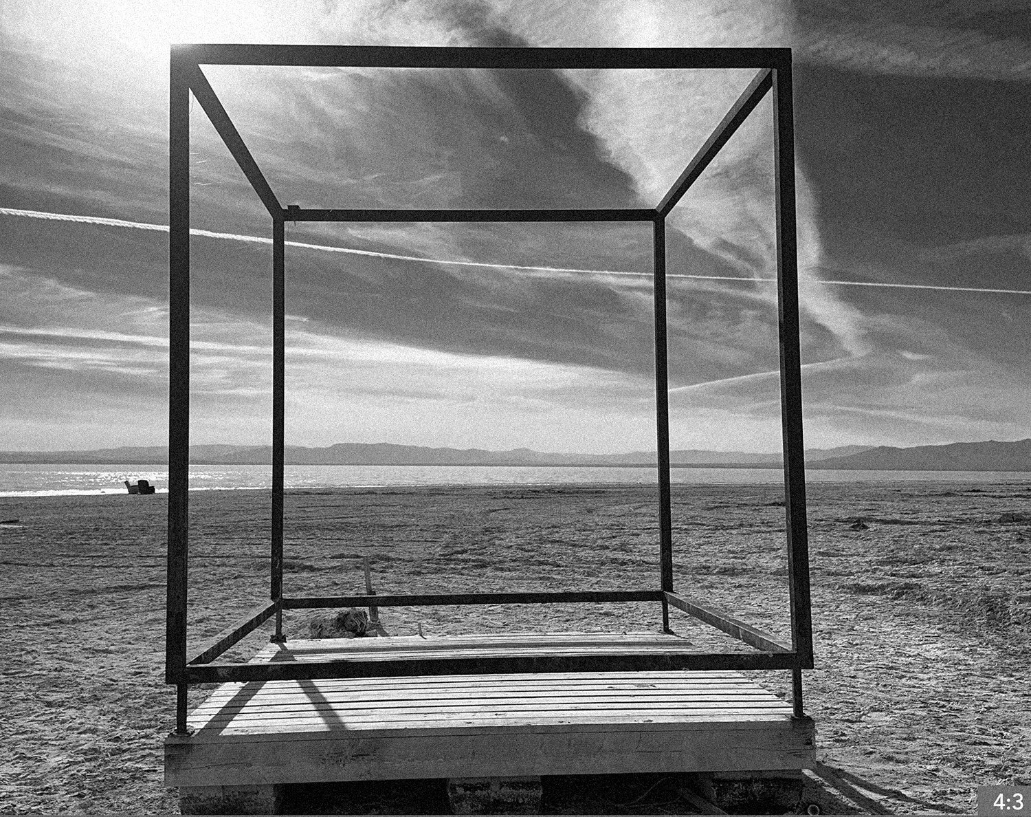 81. Salton Sea 4. SHOT PANNING a single bubble floating along.
