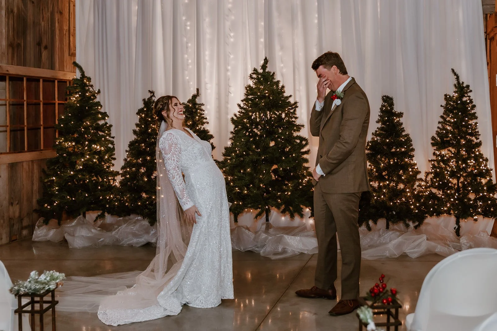 bride and groom first look with groom crying
