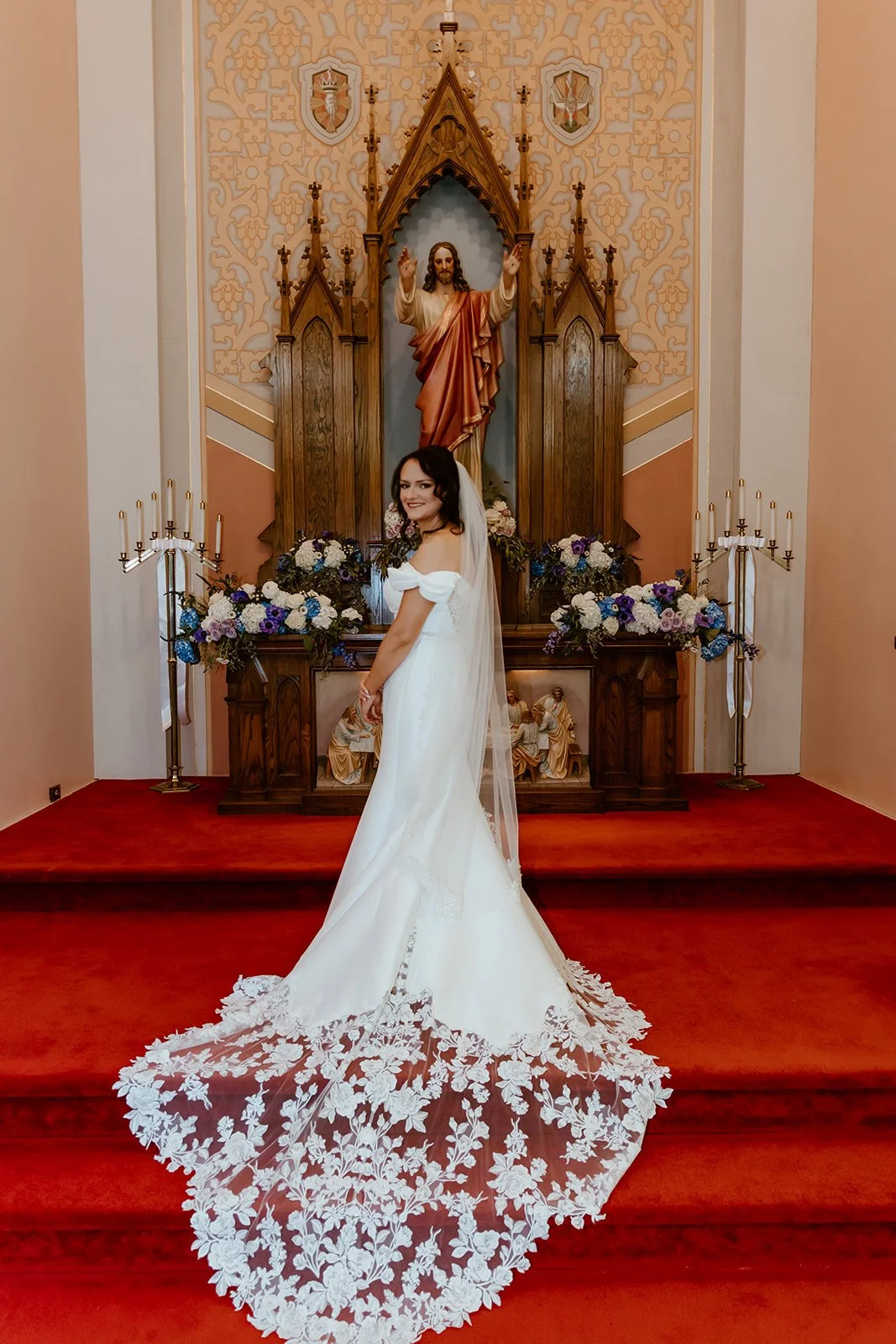 bride showing off wedding dress