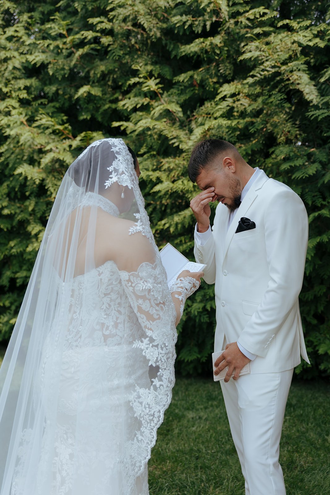 groom crying during wedding day first look