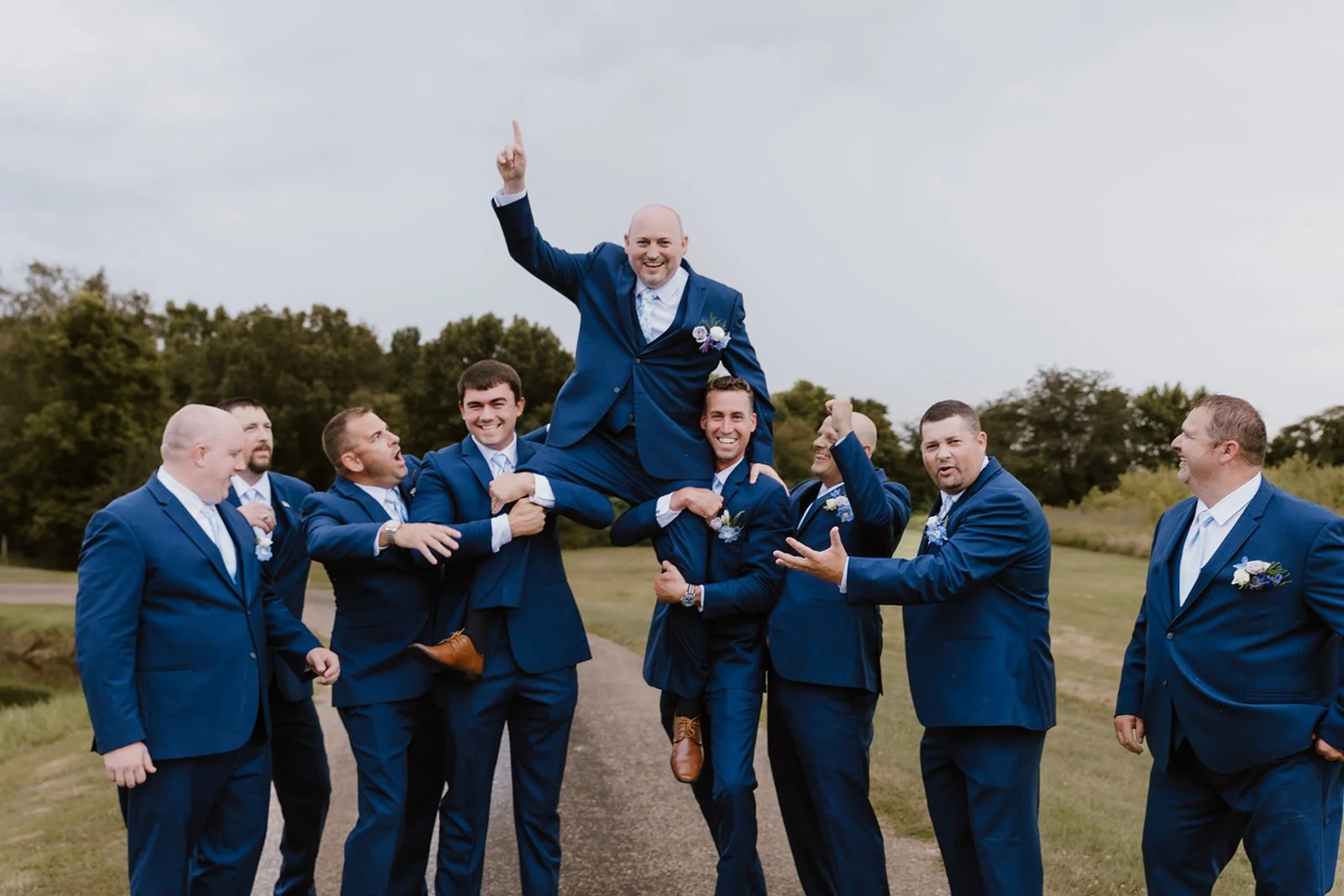 groomsmen group photo with groom