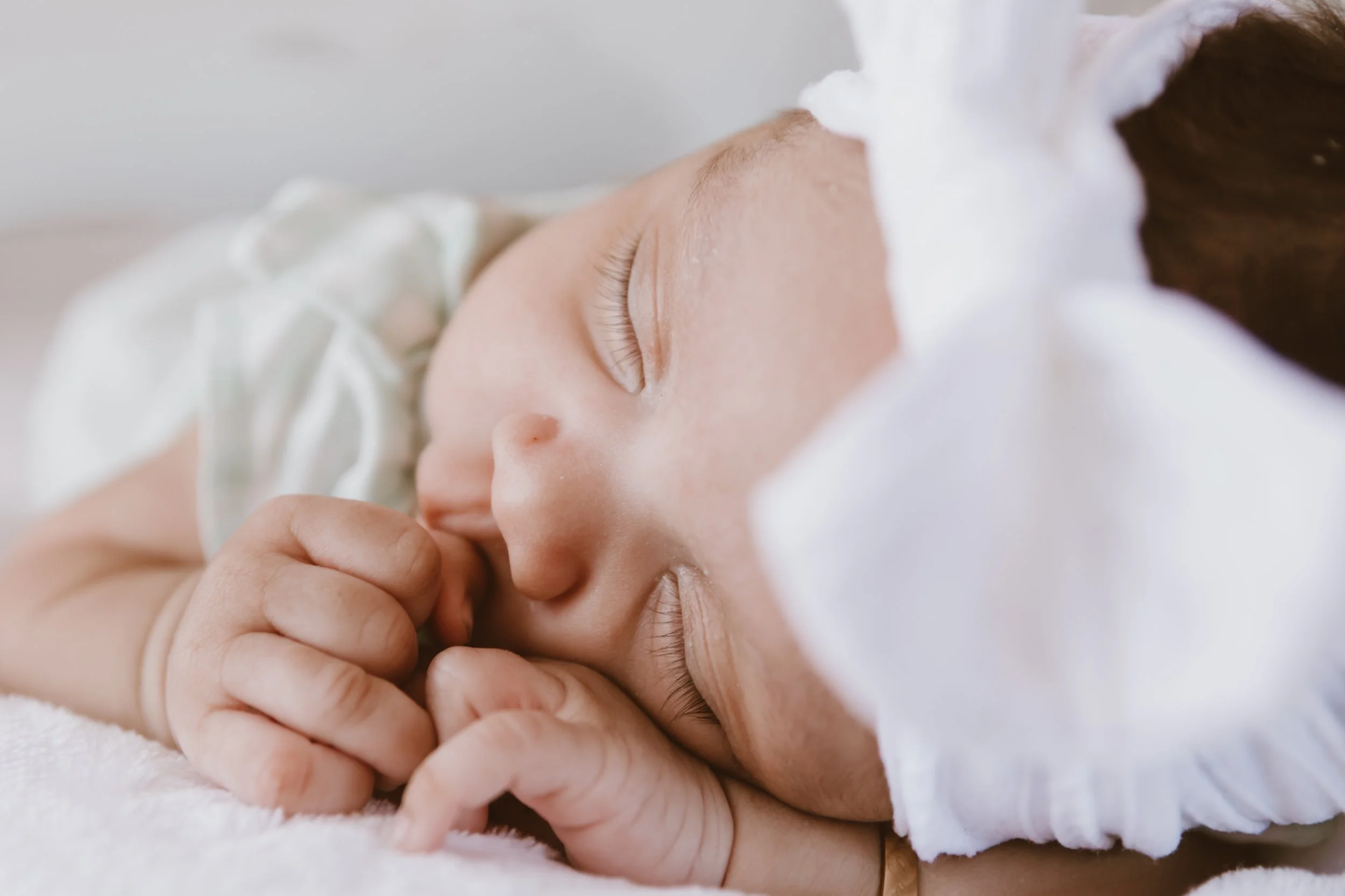 newborn baby hands resting on chest during Central Illinois newborn photography session