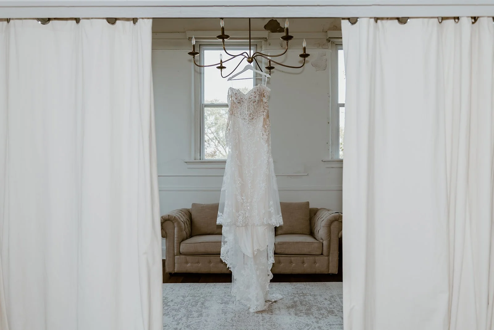 wedding dress hanging in the bridal suite at the cannery in eureka illinois