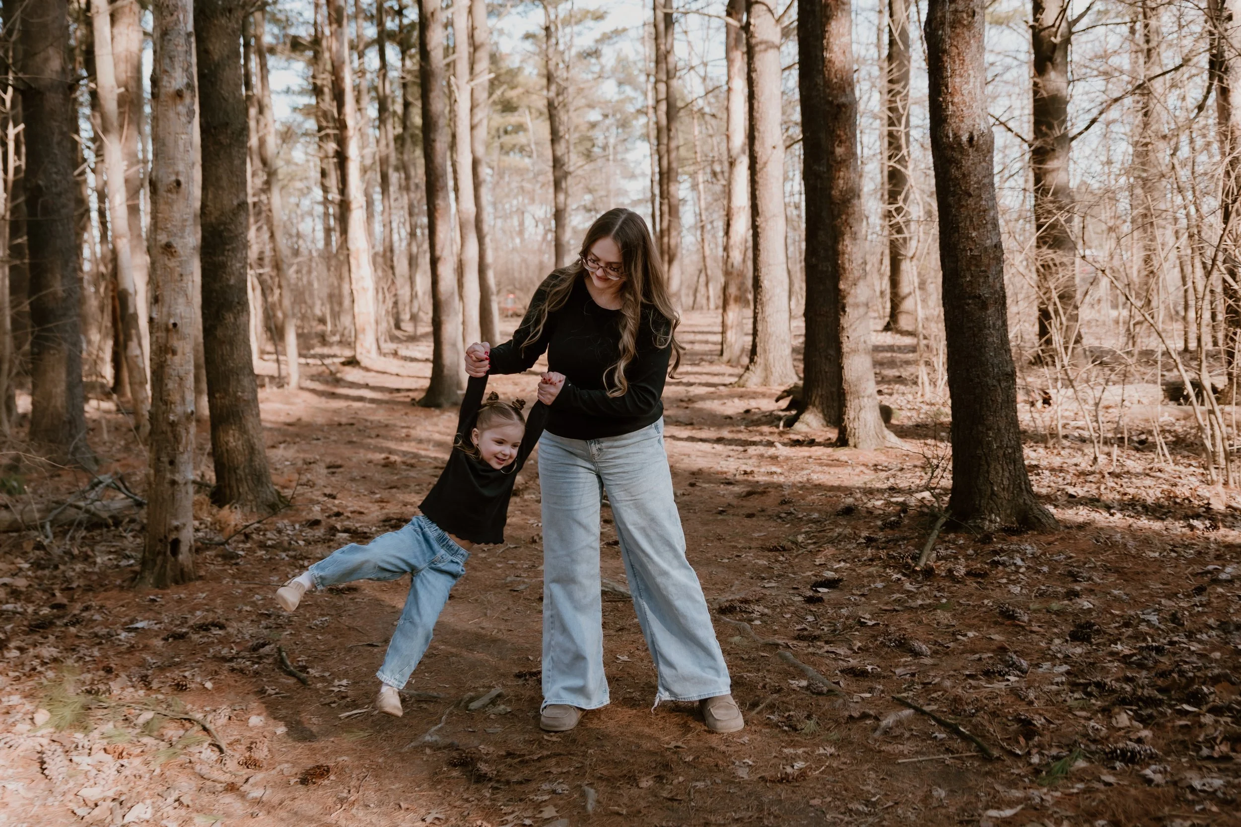Milestone family photography session documenting a growing family with a trusted Peoria Illinois photographer who prioritizes long-term client relationships.