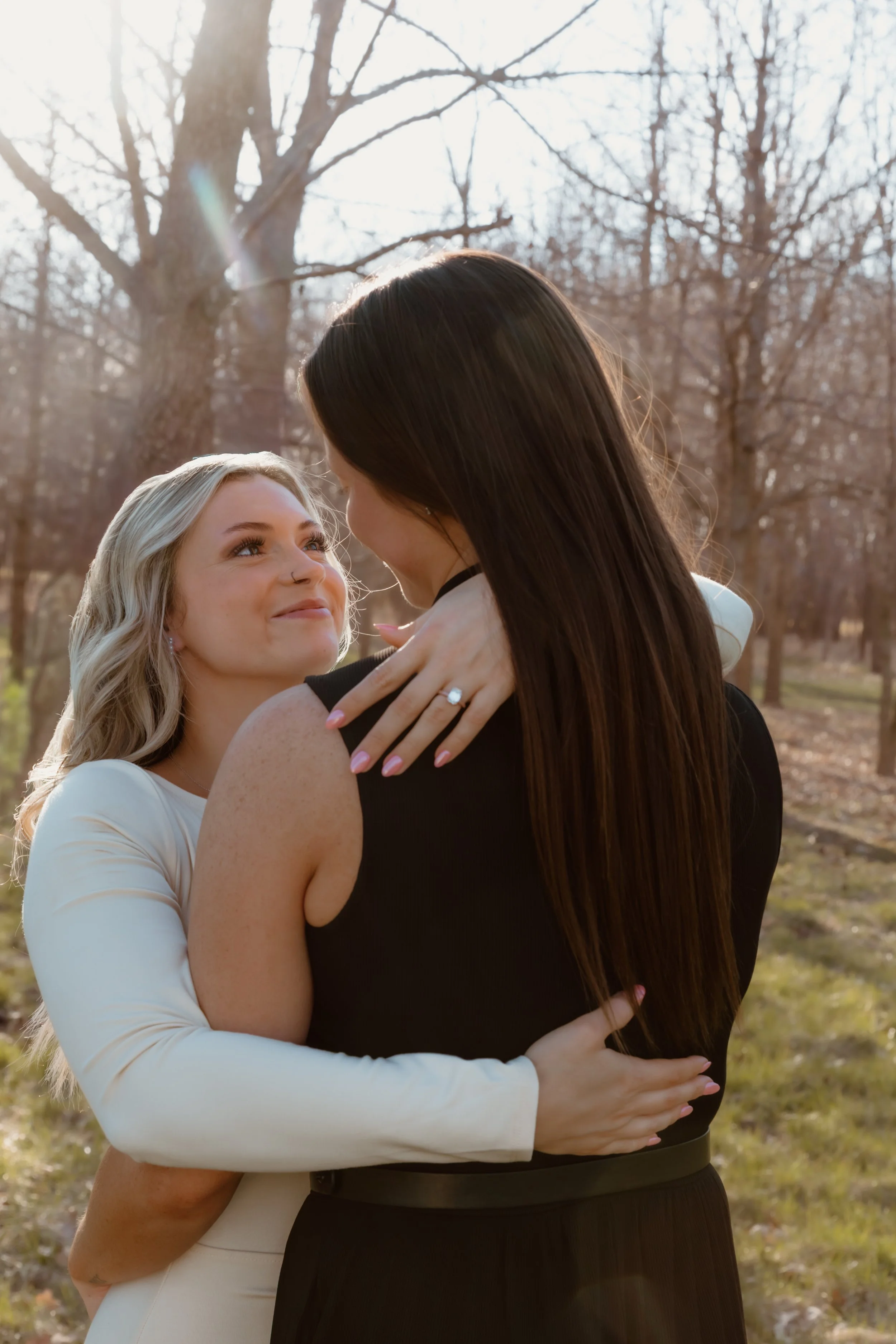 intimate moment couple forehead to forehead engagement session outdoors