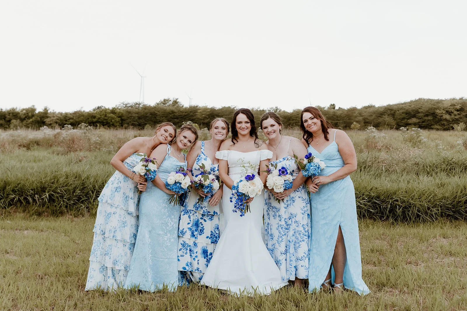 bridesmaids group photo with bride