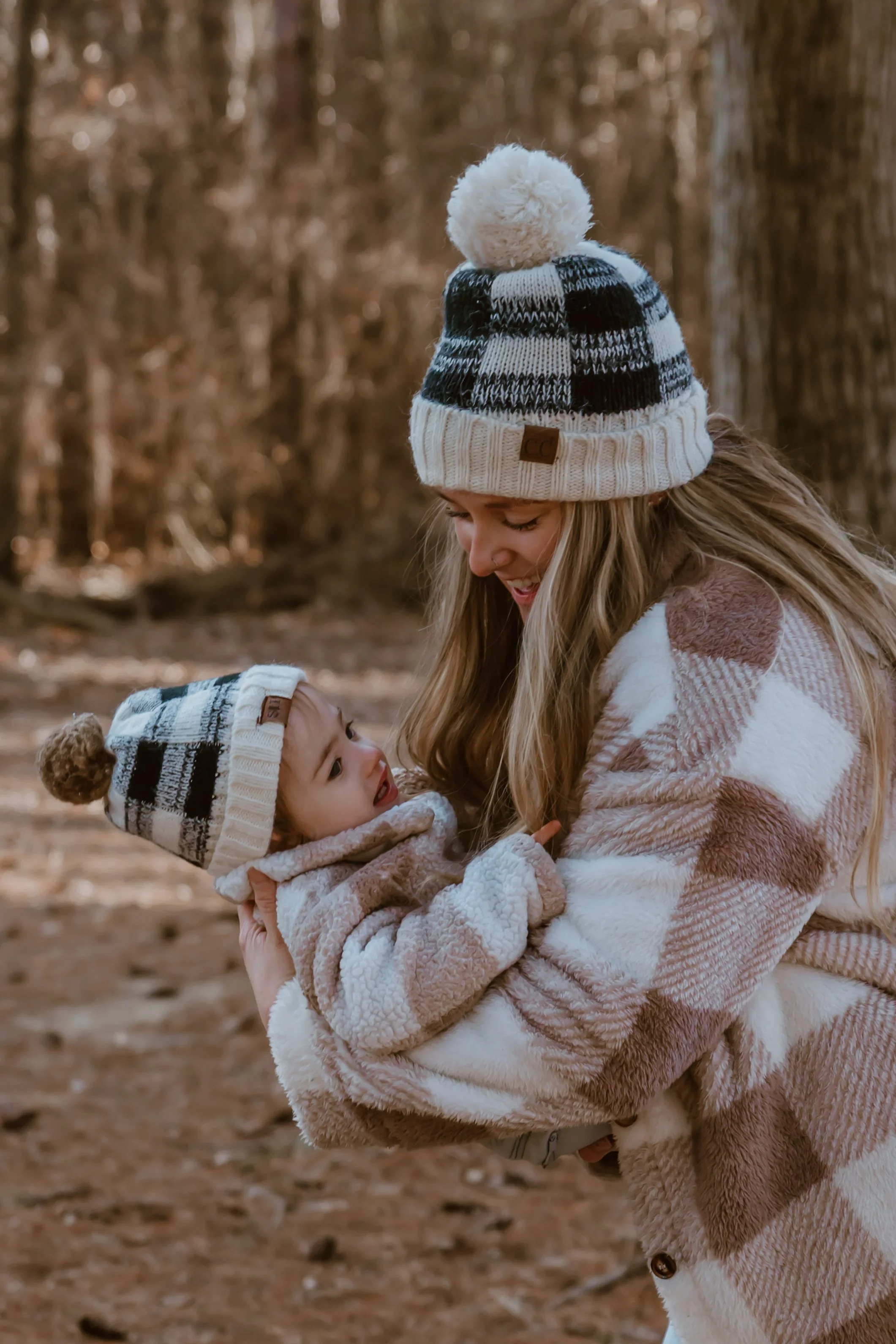 Documentary family photography session with a 20-month-old and mom during winter in Illinois
