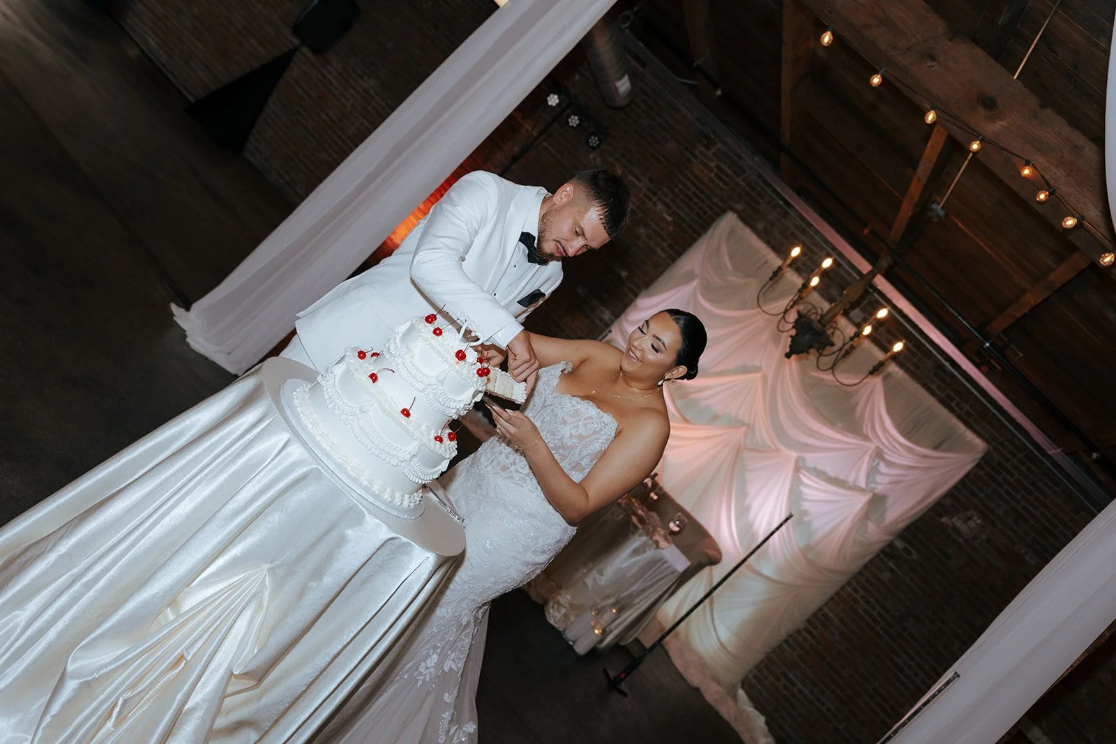 photography of cake cutting at wedding ceremony at the cannery in eureka illinois