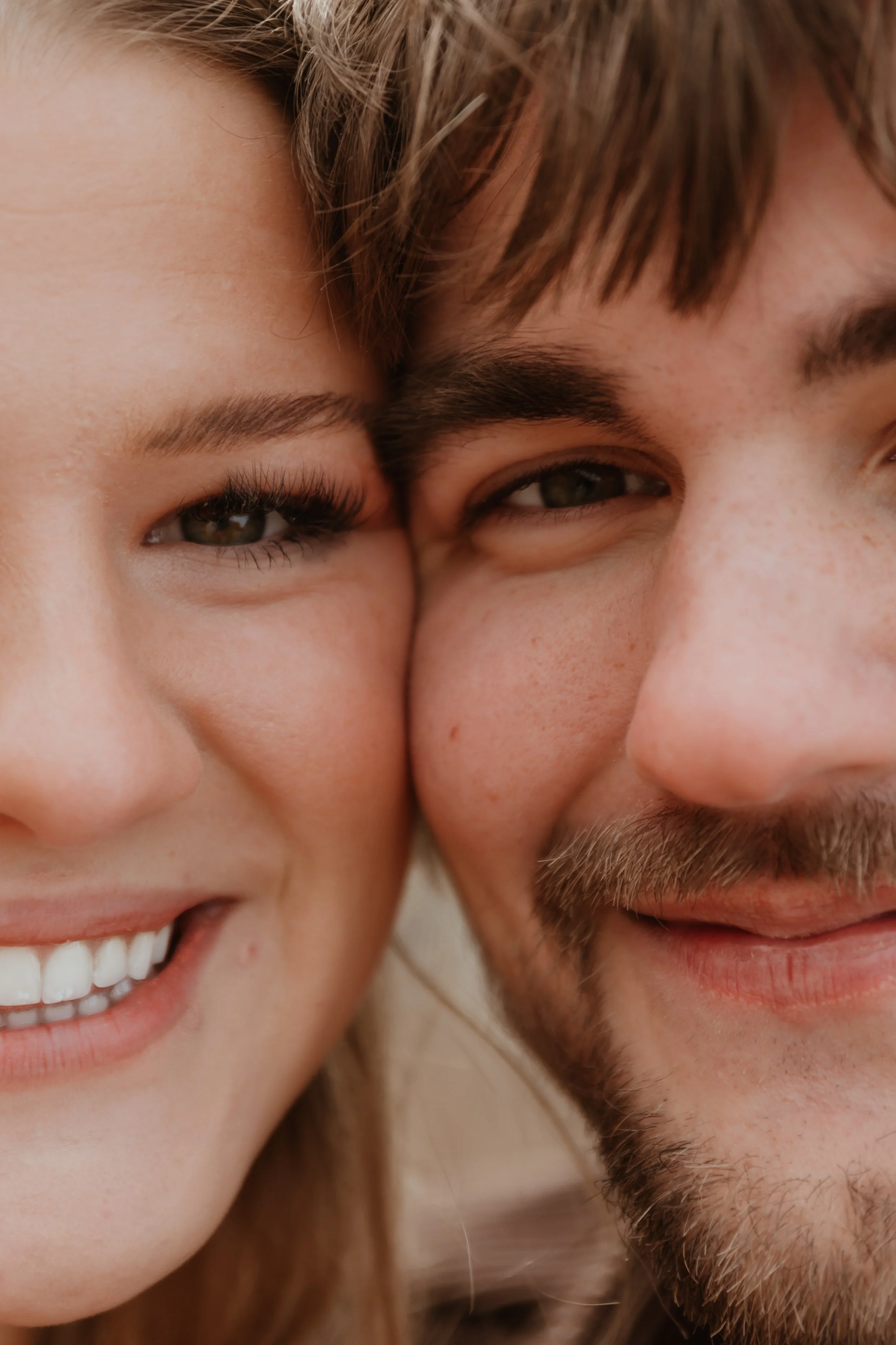 Close-up of couple smiling together during a couples session in Peoria Illinois