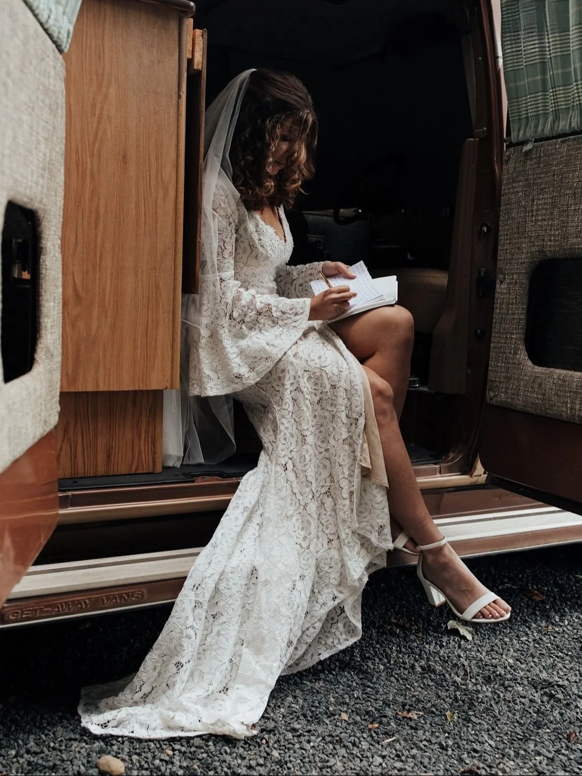 Bride using vow booklet