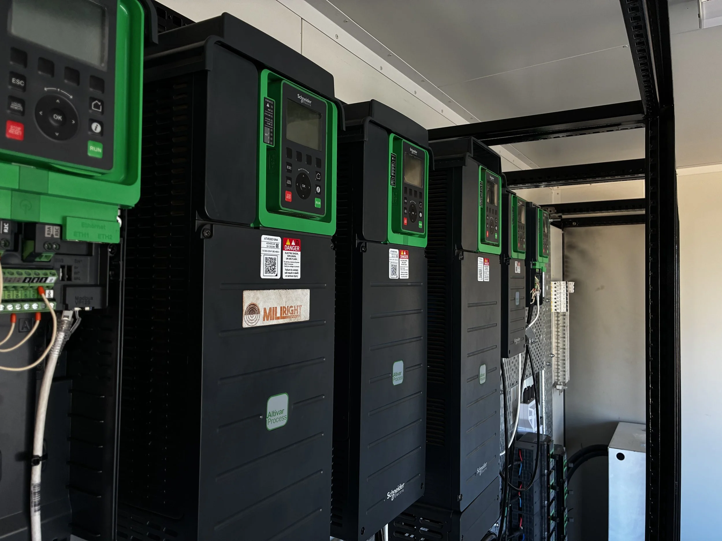 Industrial electrical control panel with circuit breakers and wiring