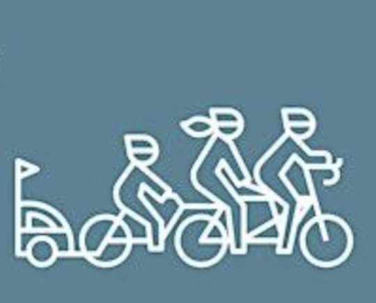 A white line drawing of a family on a tandem bicycle with a child on a trailing bike and a small trailer, set against a blue background.