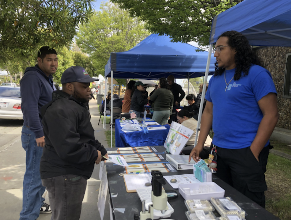 Volunteers tabling at Martin Luther King Jr. Day in North Richmond.
