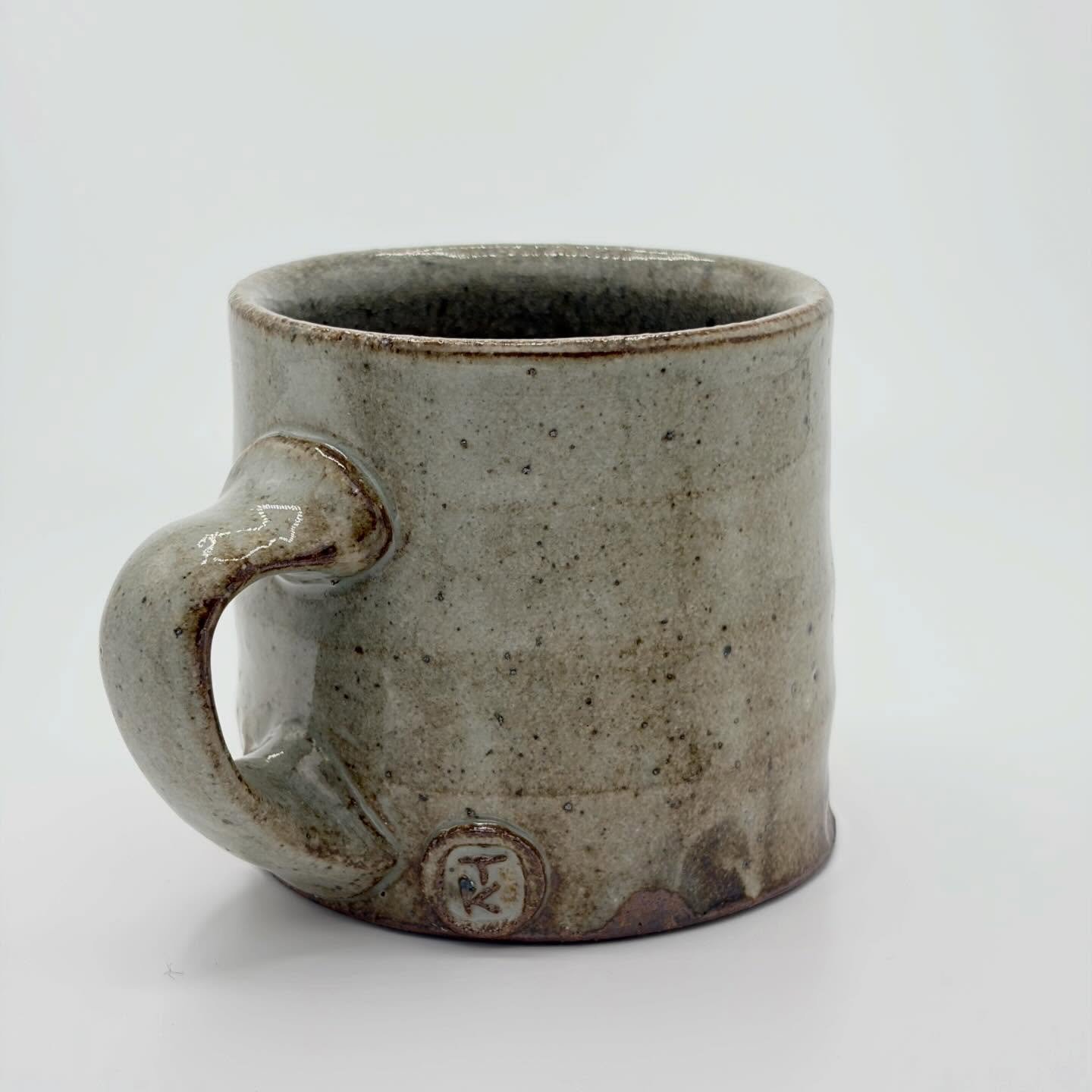Slipped mug, fired to ^10. Really comfy one-finger handle. I have just added this mug, and a couple others, to my web shop &mdash; if you&rsquo;re into that sort of thing!