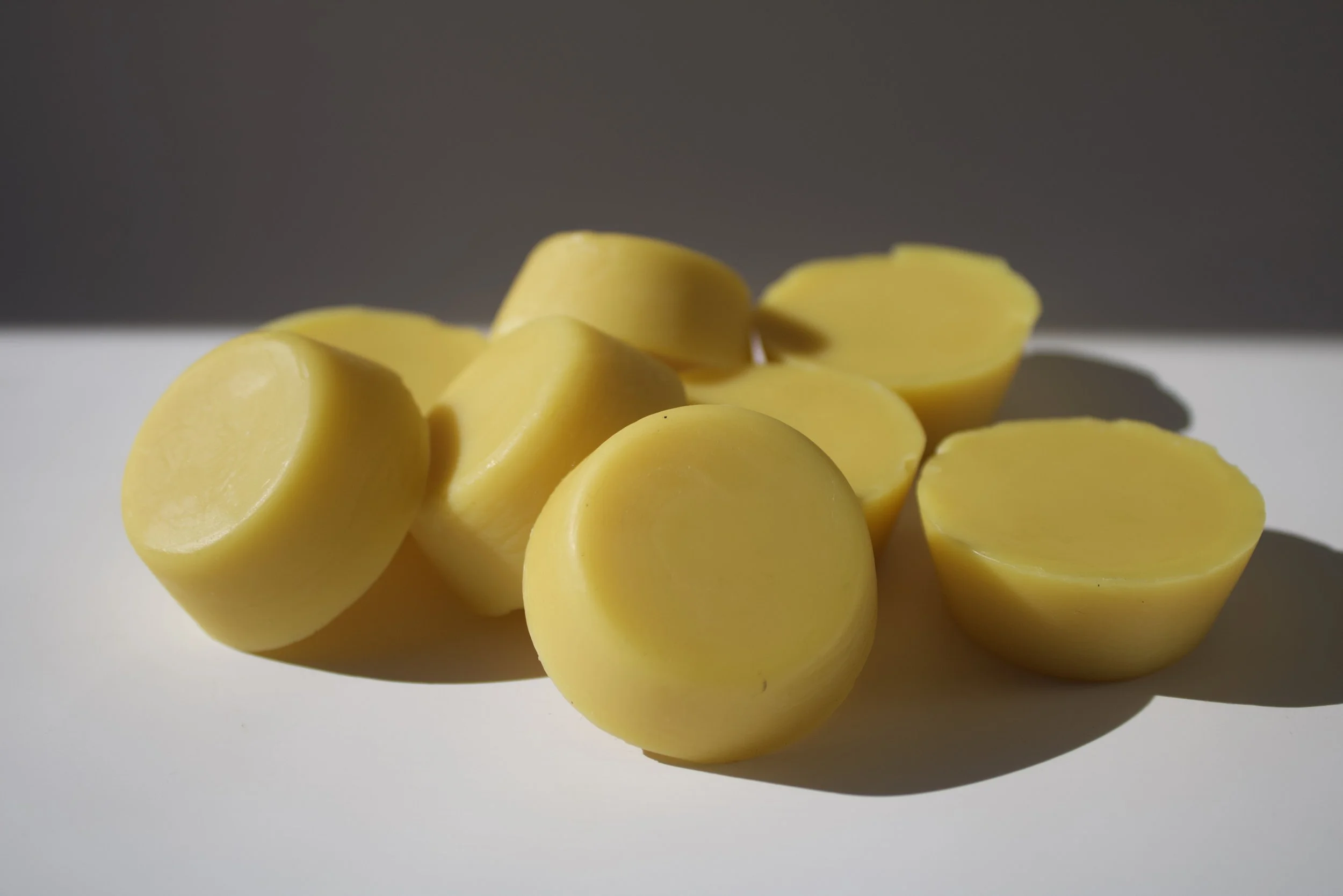 A Pile of Coastal Love Surf Wax