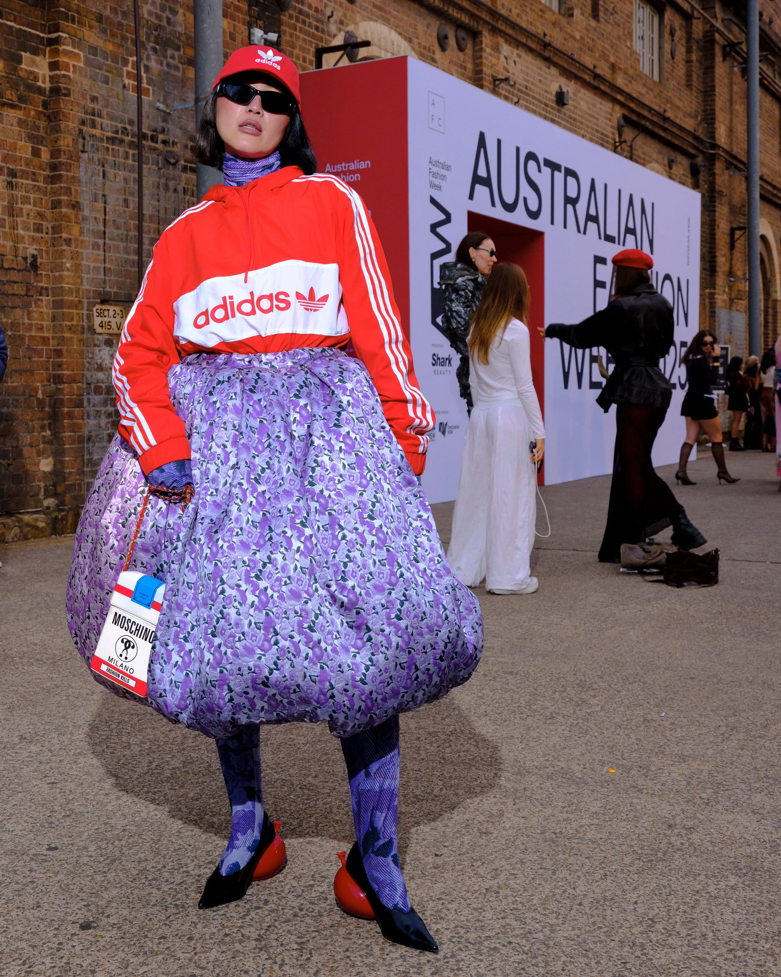 12. Fashion Week attendees in Sydney photographed in editorial street style environment featuring Charlene Davies