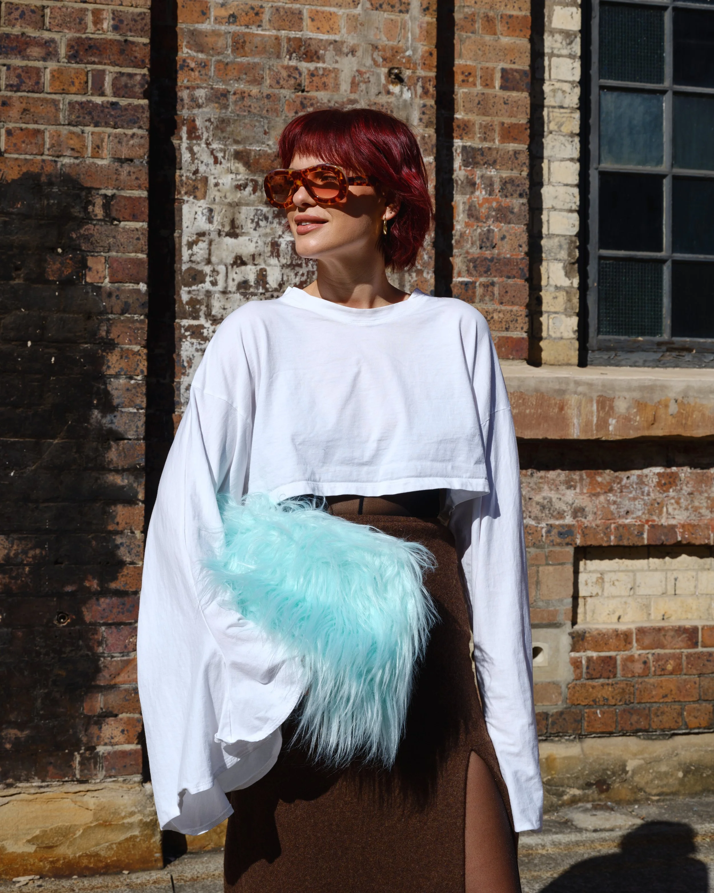 Street style capture at Australian Fashion Week Sydney showcasing modern fashion trends