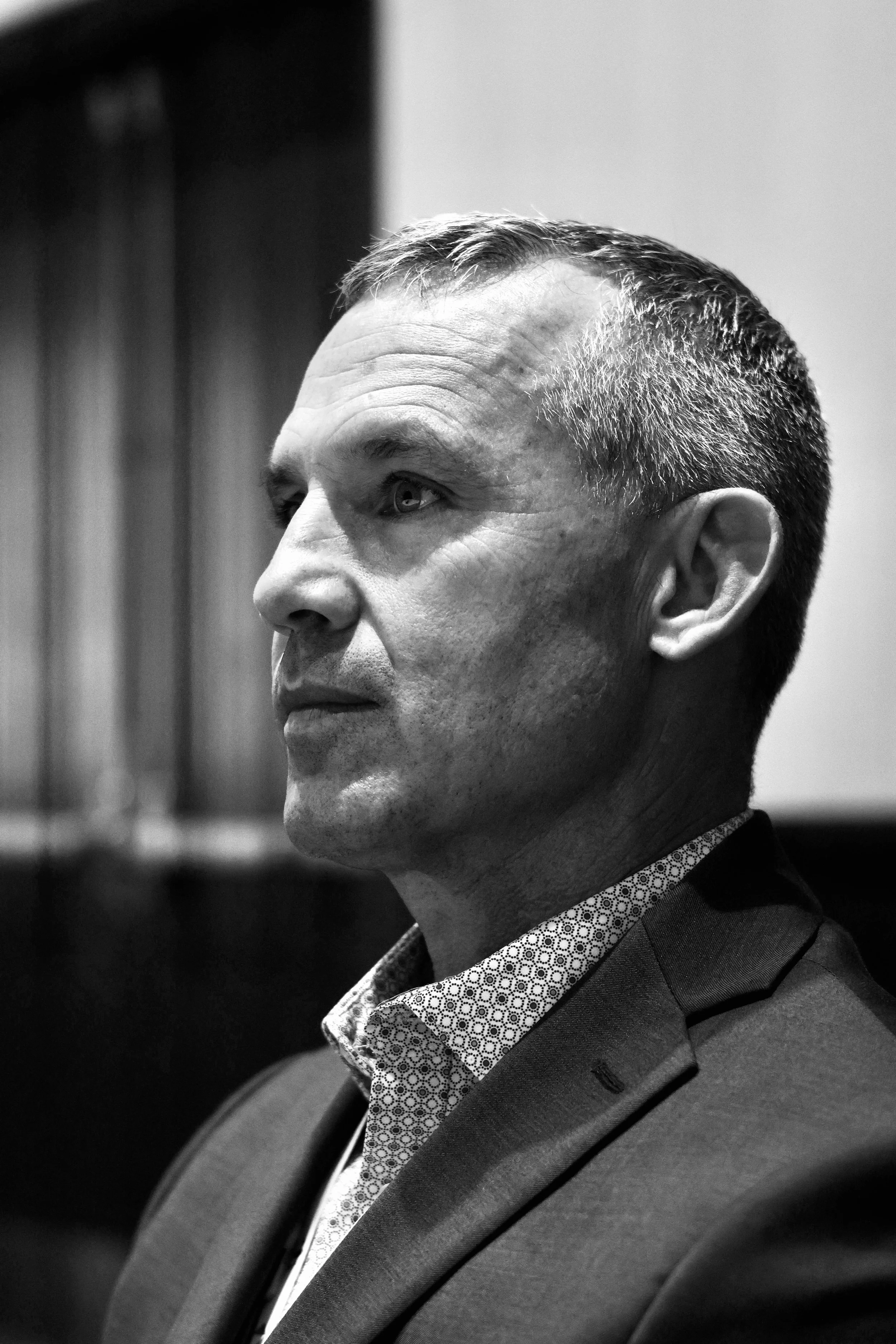 Black and White portrait of Dr. Devin Olio