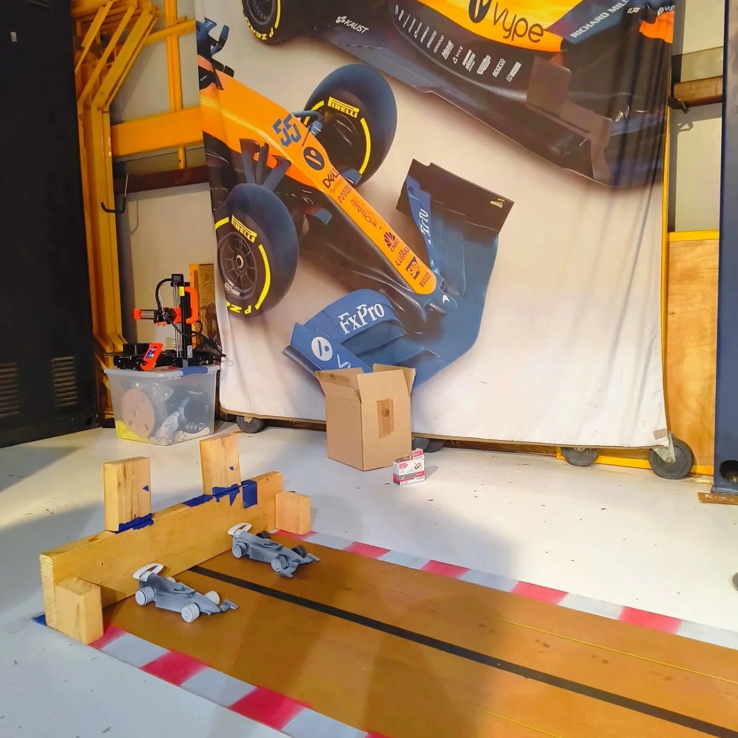 Thanks to our sponsor 1821 Club, we had the chance to attend a Mechanics Party this past Wednesday.  We had a display booth where we showed off different prototypes of past cars, and we also set up our track so attendees could race our cars themselve