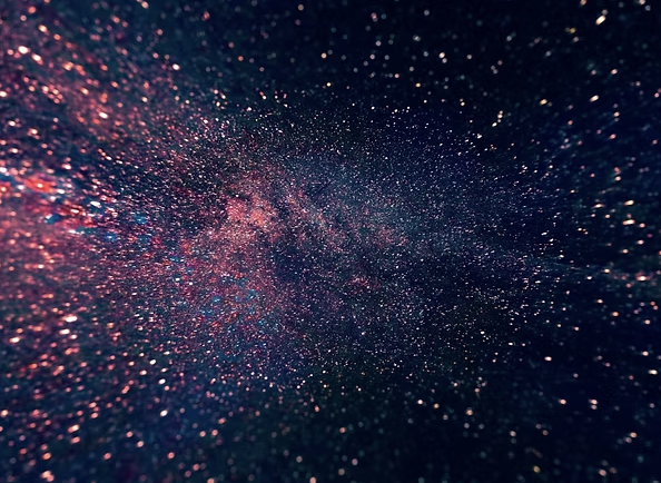 A view of the universe showing countless stars and galaxies in space.