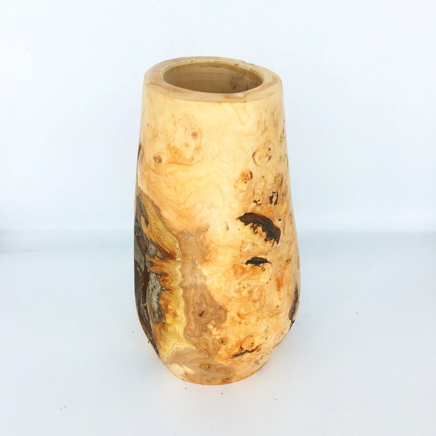 This maple burl vase stands about 10 inches tall by 5 wide.

I am shipping this off to galleries shortly where they mark up the price. I will sell this wholesale for $75 - contact me via DM's.
