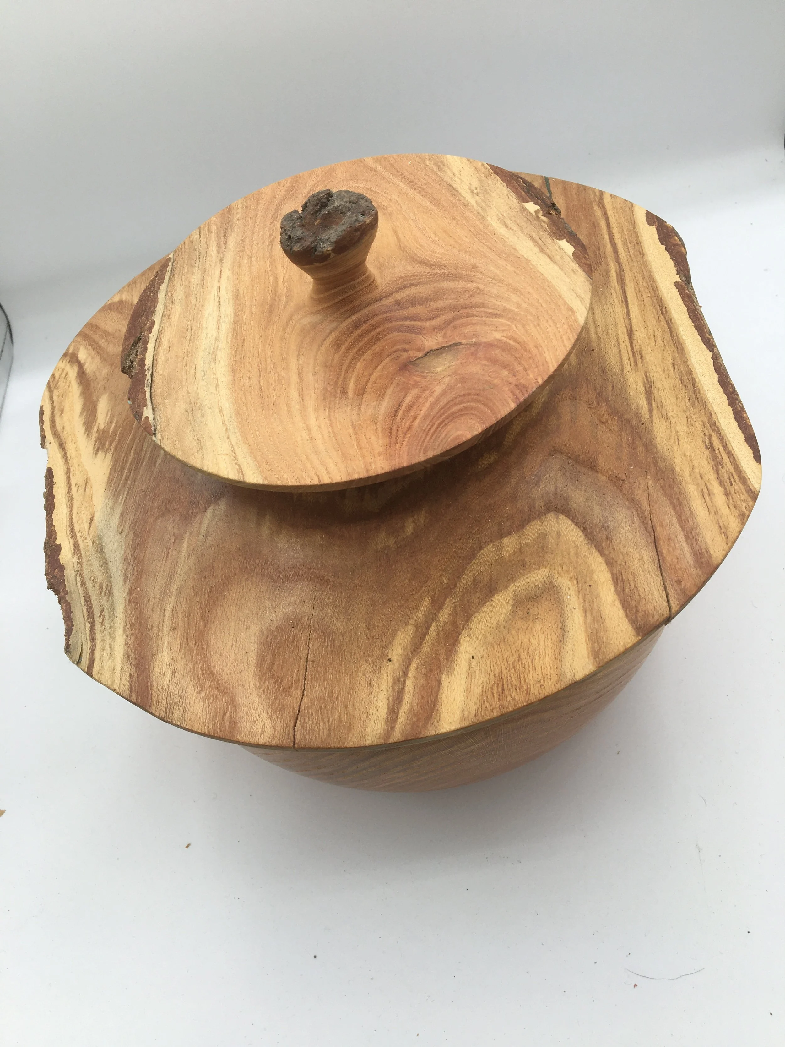 Oak vessel with natural edge and asian form with lid