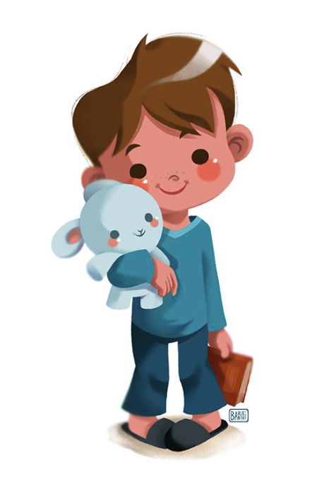 A little boy holding a teddy smiling