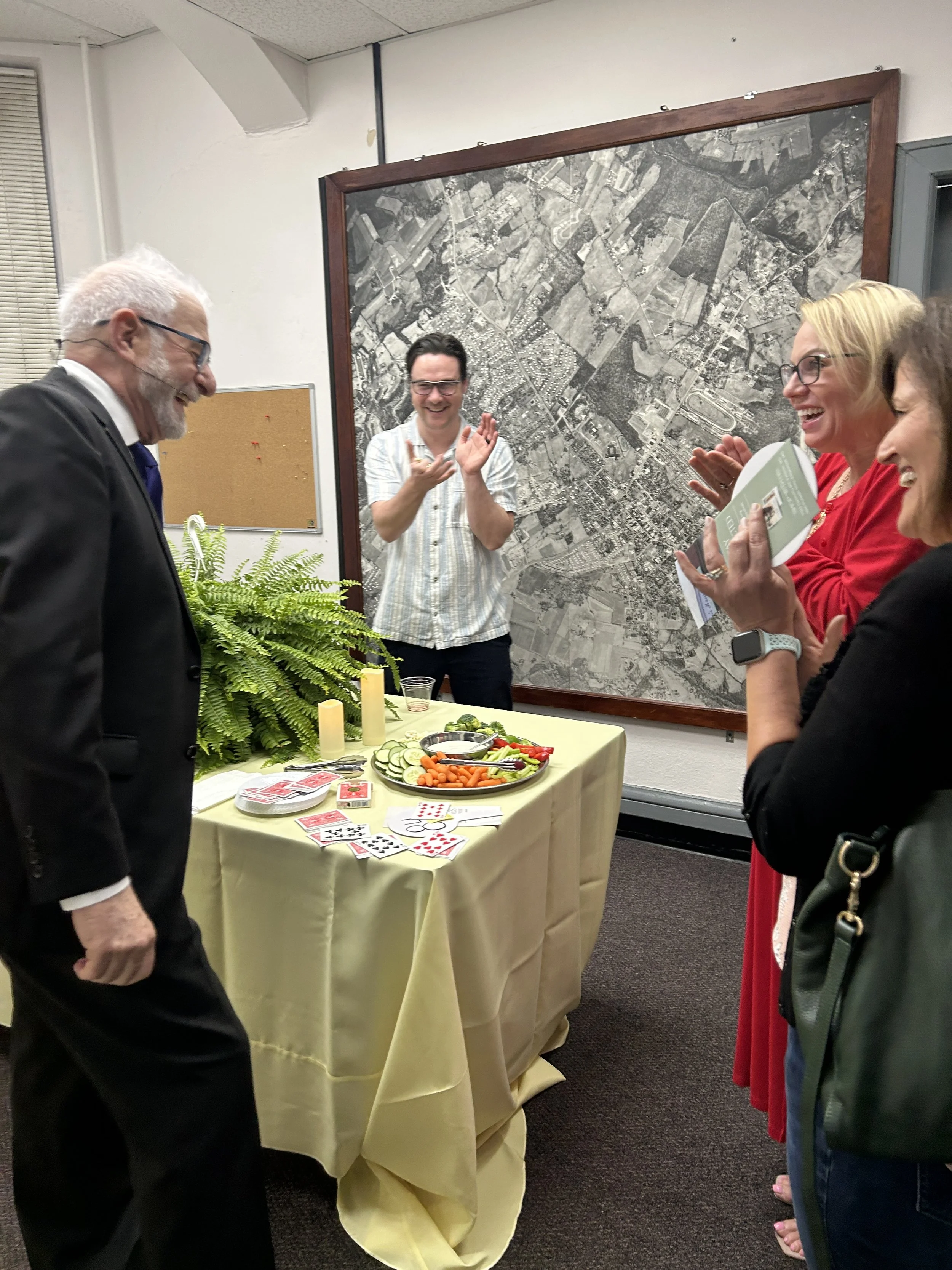 Audience reacting to magician Vincent La Padula during a live performance