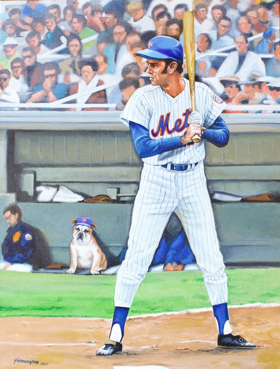 A baseball player in a New York Mets uniform standing at the plate, holding a bat, with a crowd in the background and a bulldog wearing a Mets cap sitting behind the dugout.