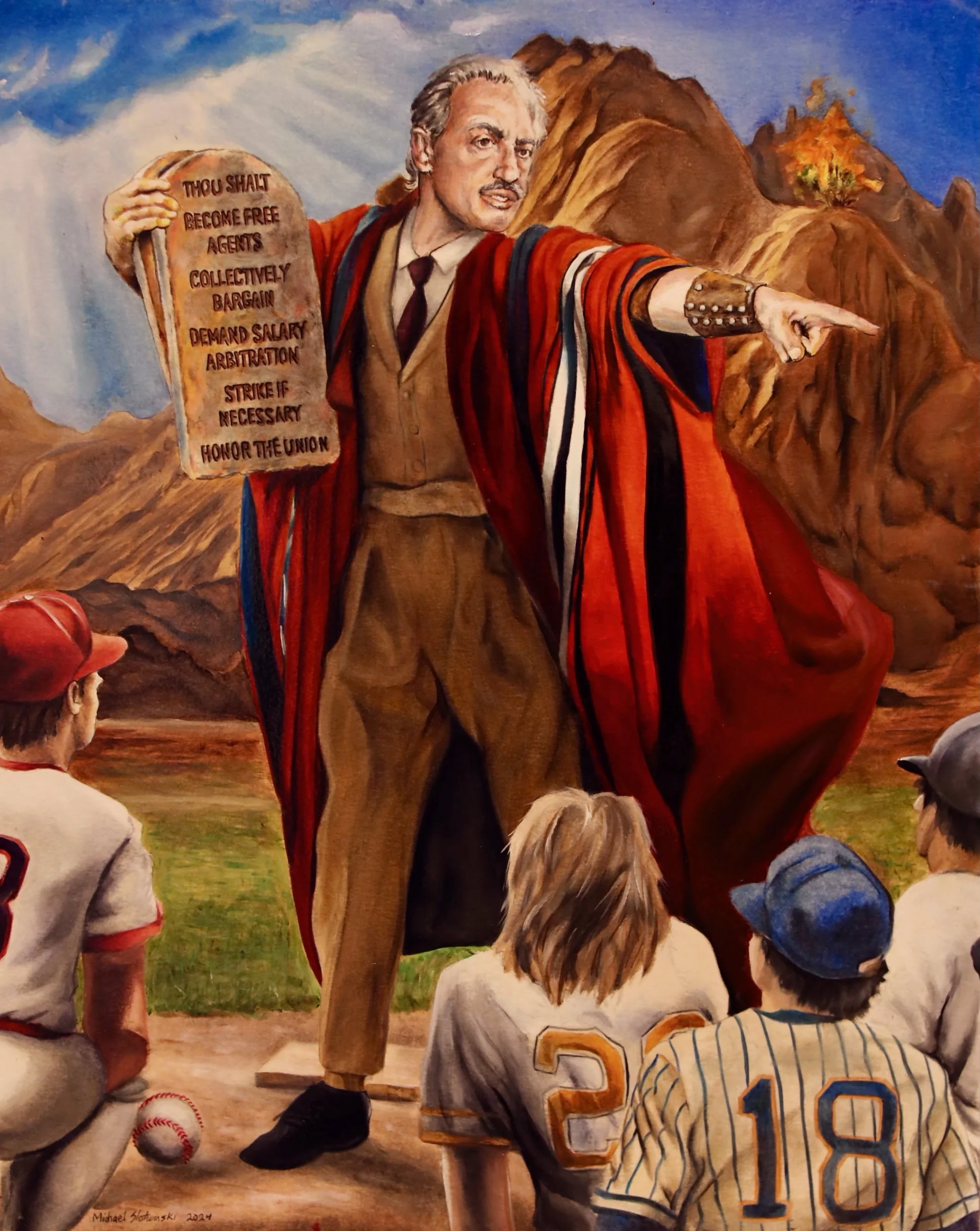 A mural depicting a man with gray hair and a mustache pointing forward while holding a stone tablet with an anti-communist message, surrounded by children in baseball uniforms, with mountains in the background.