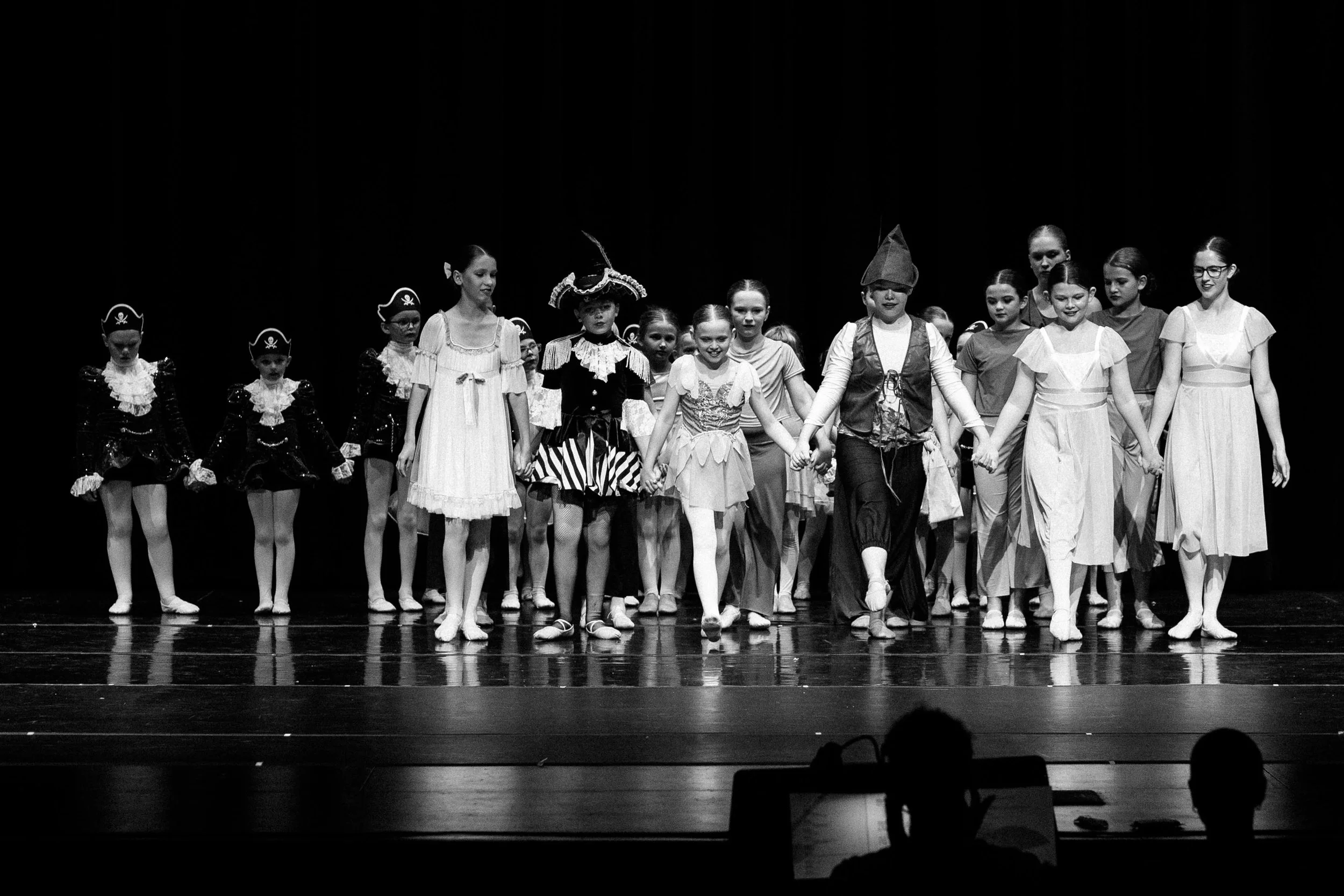 Dance Factory East students taking their final bow during the annual dance recital in LeRoy, Illinois.