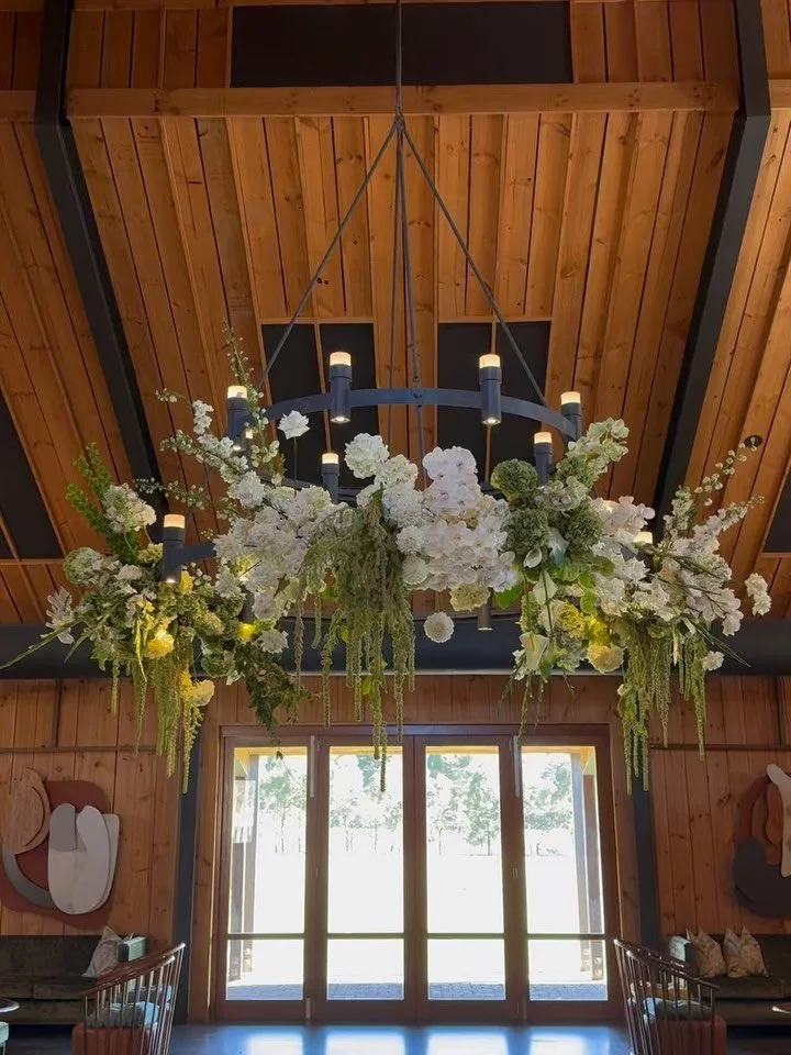 For Melissa and Ben, we wanted the dance floor to feel like a considered part of their overall design rather than simply a space left open for dancing.

Their floral installation needed to draw your eye into the space, create movement, texture and di