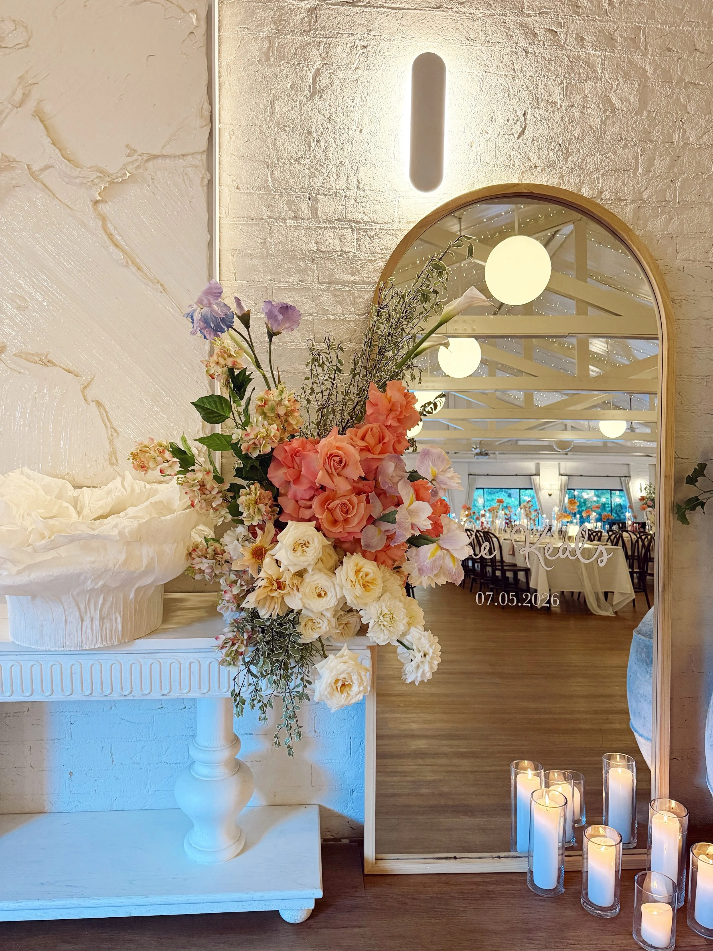 Emma and Harry at  @thelodgejamberoo 

Luxe, romantic pastel tones layered with all our favourite flowers of roses, orchids, delphiniums, dahlias and iris. The designs came together through a considered mix of colour, texture and shape, creating an a