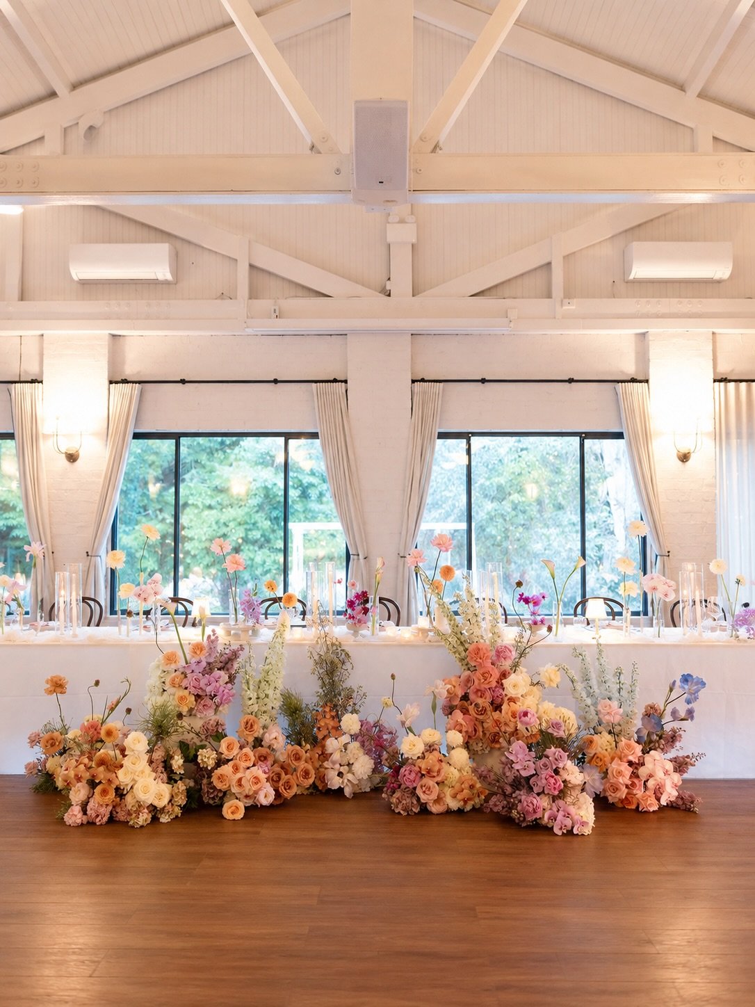 Could you tell these floral arrangements at the base of the bridal table were once part of the ceremony design? 🌸

When we design our ceremony flowers, the focus is always on creating something incredible within that space but we&rsquo;re also think