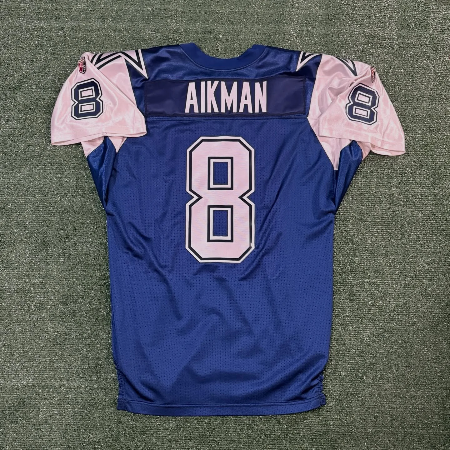 Troy Aikman Dallas Cowboys 1995 Alternate Jersey 

This originally had an old beat-up lettering kit with the blue vinyl almost completely gone. I replaced everything with brand new dazzle twill stars and numbers.

For Sale!